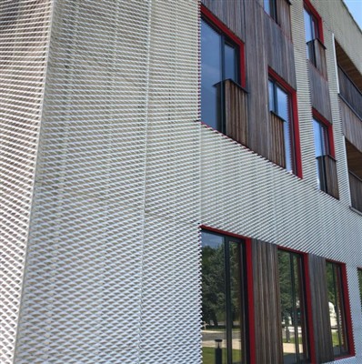 How is expanded metal mesh manufactured?
